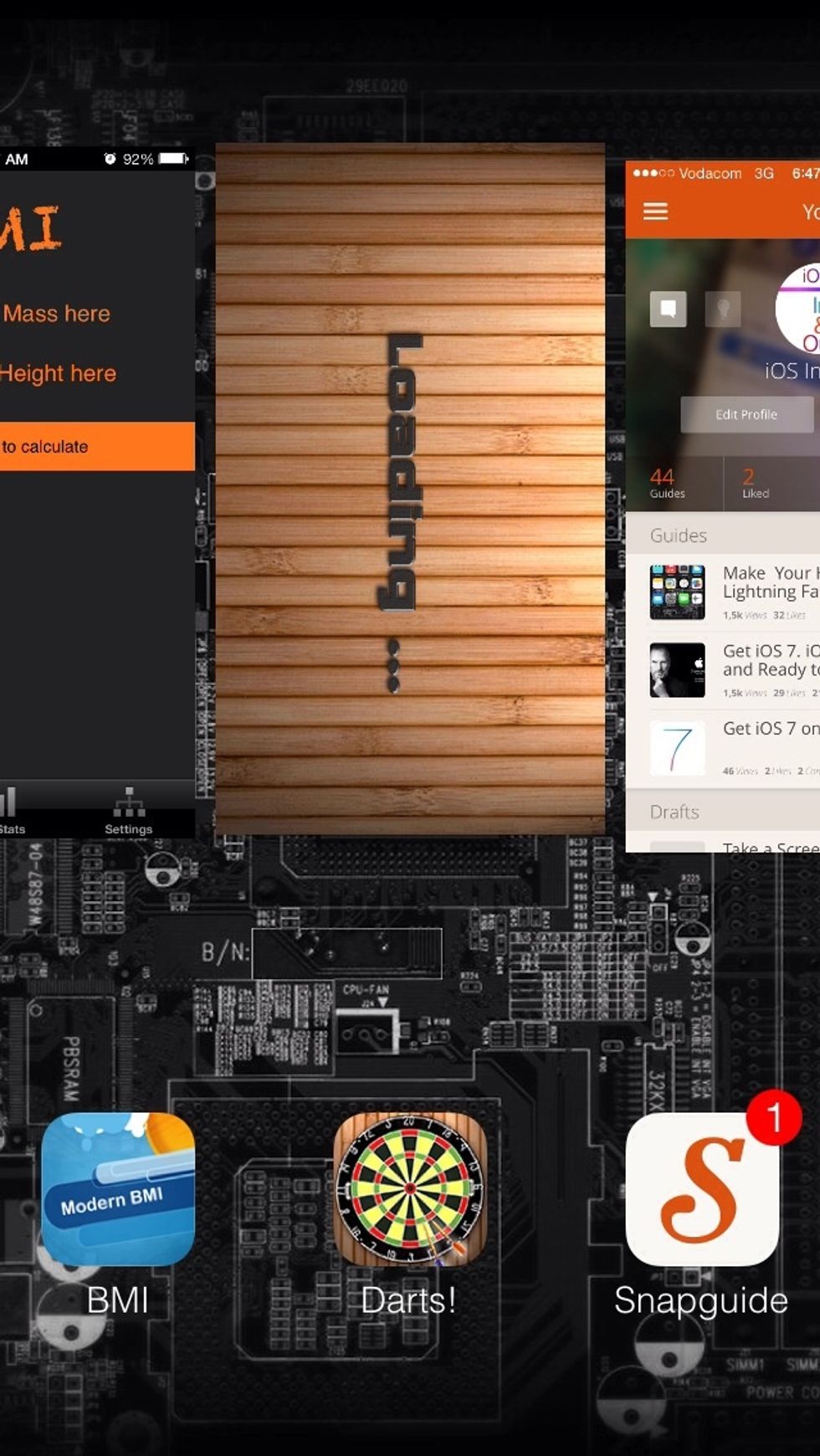 Once your fingers are placed on the three apps swipe up.