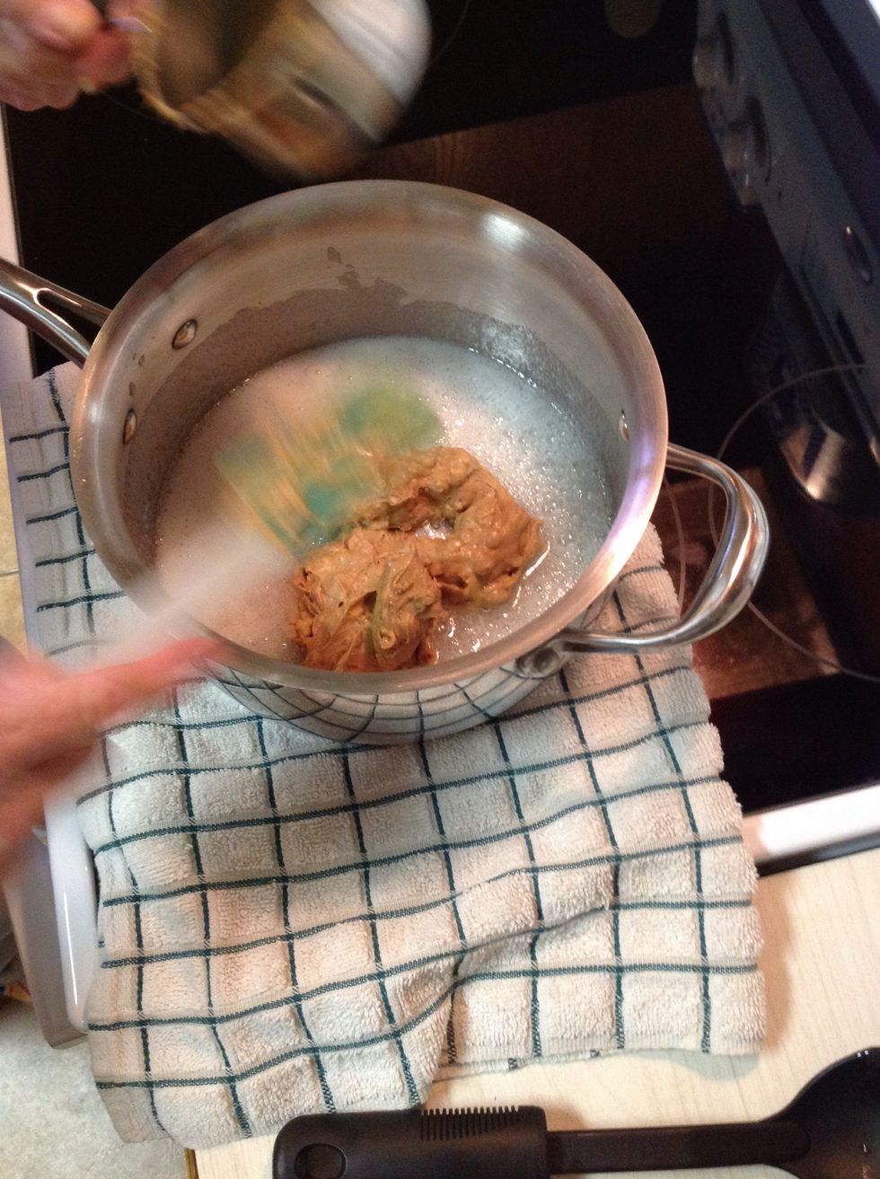 Once your get the sugar boiling, pull it off the heat and add the peanut butter and mix well.