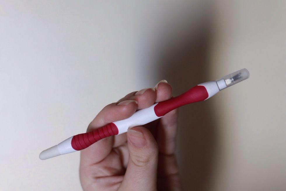 Once your nails are trimmed and filed, you want to get your cuticle stick.