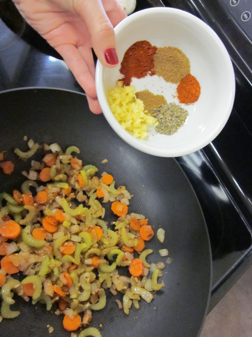 Once your vegetables are sauteed then add all of those spices.