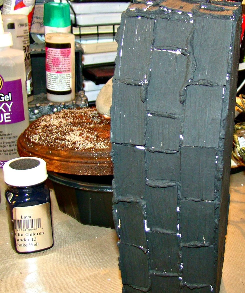 Once your wood pieces are dry, paint the entire surface with Tuxedo black.
