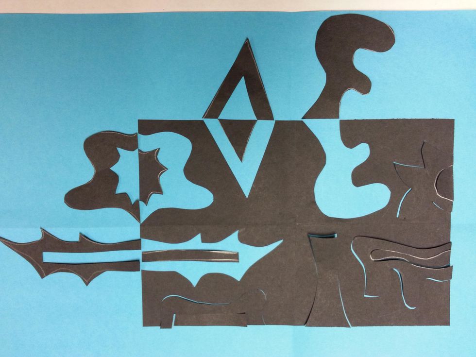 One at a time, flip the shapes to the outside. (The smaller, inside shapes need to stay put when you flip the larger pieces out.)