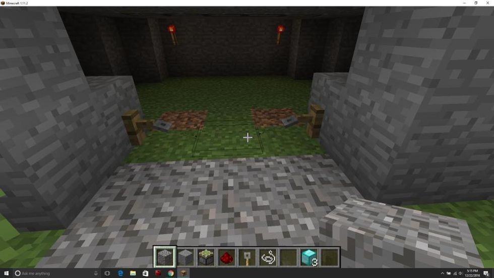 One block behind the entry way place a block that lines up with the edge of the entry way. Place tripwire hooks on those two blocks and use string to connect them.