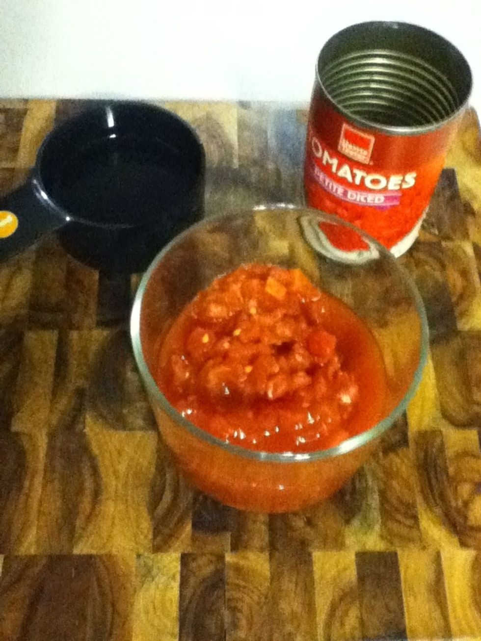 One can of diced tomatoes is a a scant two cups. Have that ready, plus a generous cup of water.