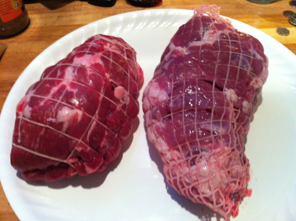 One deboned pork butt and one deboned shoulder.