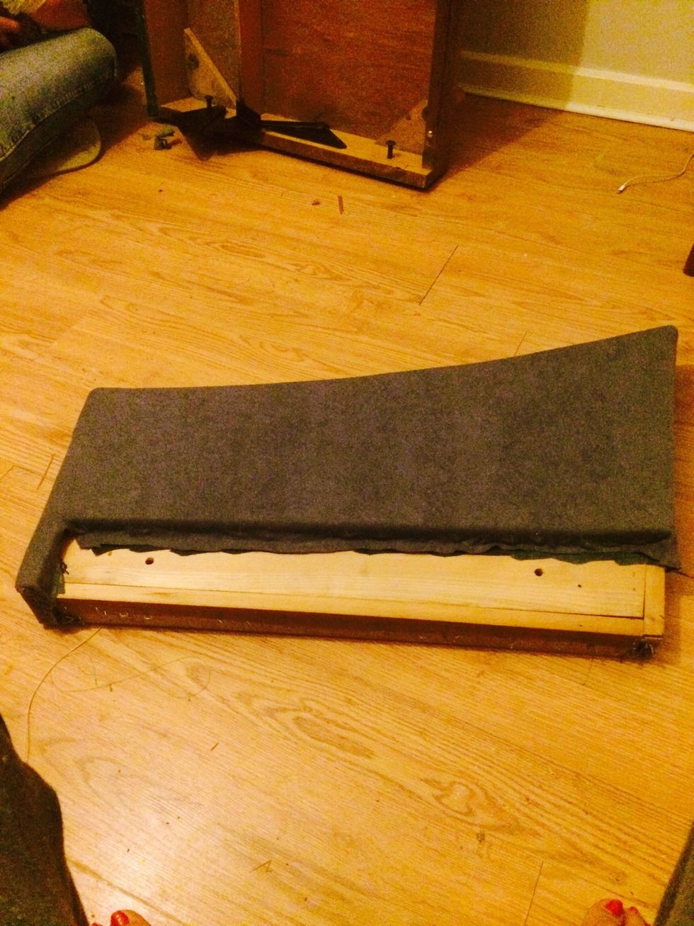 One done... To ensure fabric is smooth. Fix one side, then do opposite side. Then do the same on the two remaining sides. Cut away unwanted fabric.