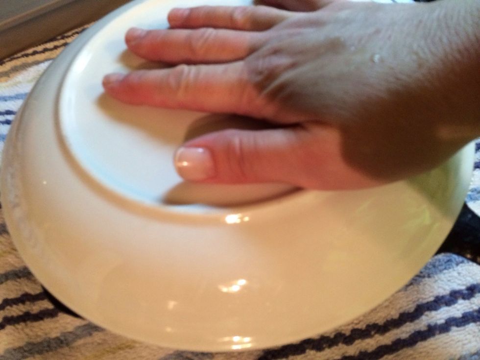 One hand on plate.