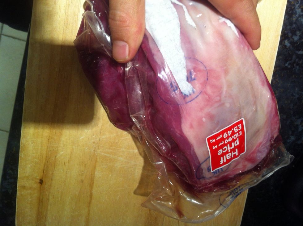 One leg removed from packaging dabbed dry with a paper towel