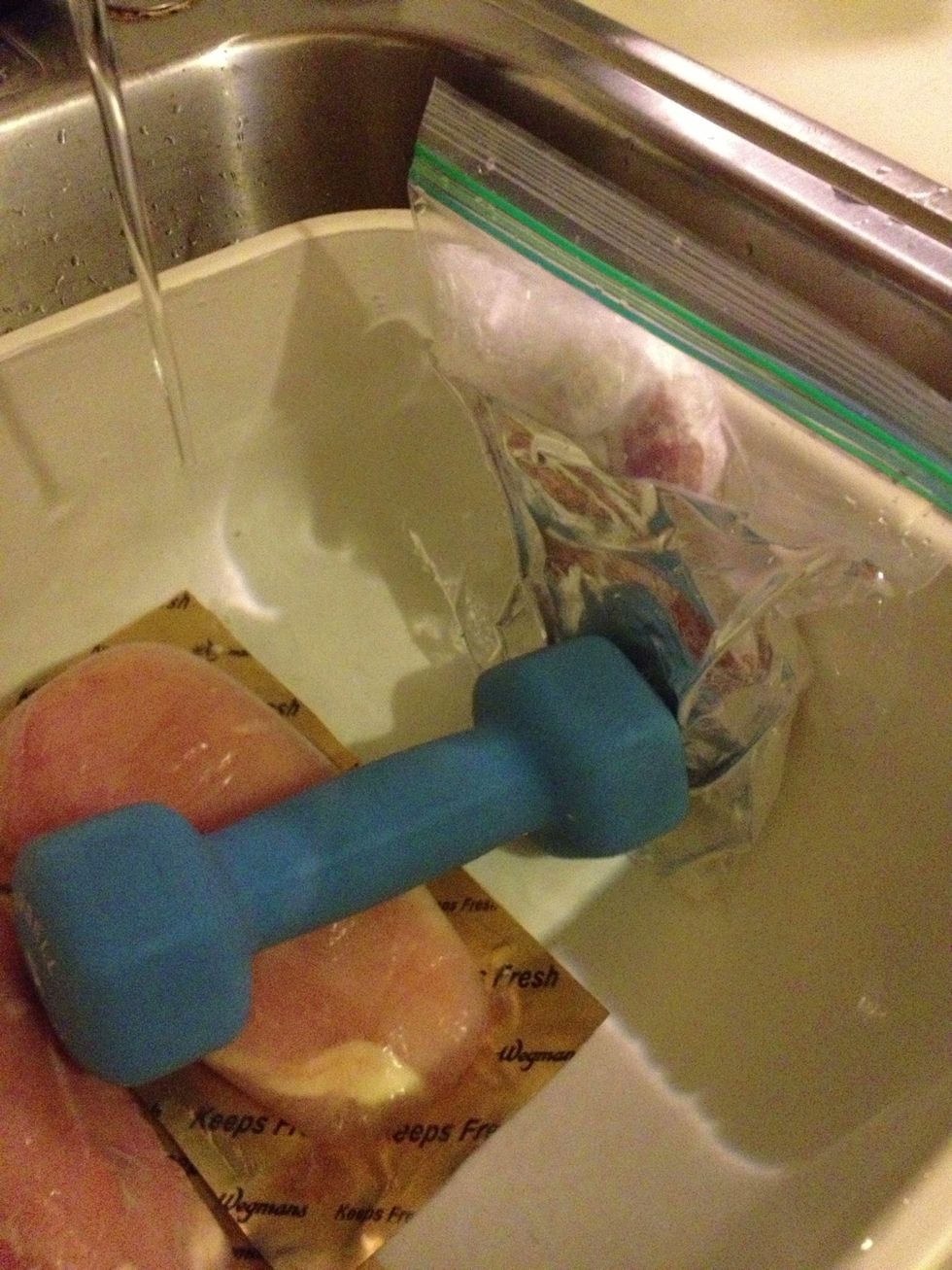 One method is to keep in a Ziploc bag and run under flowing cold watering a tub. Here I have the bag weighed down with a weight. Note how the zipper is above water level.