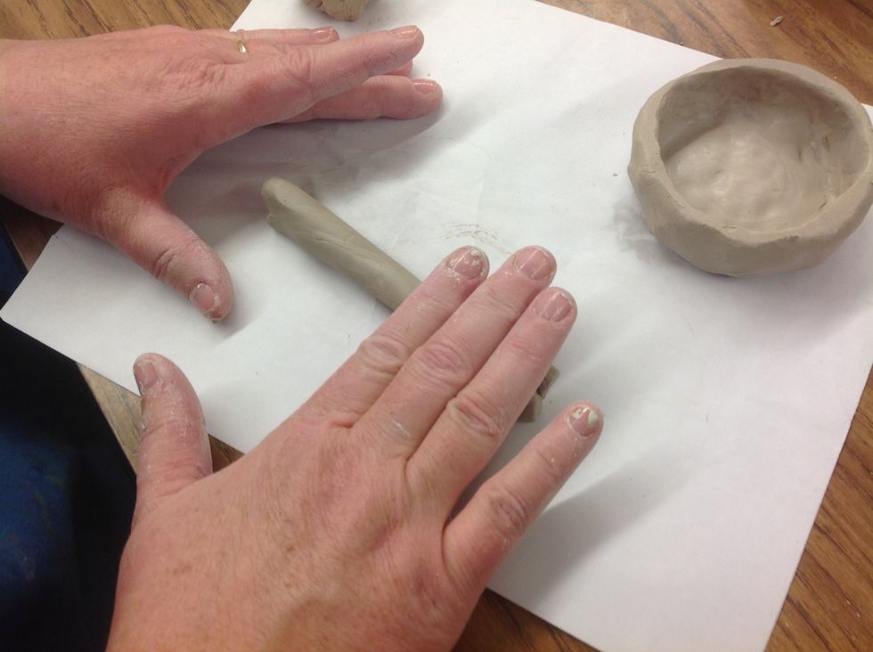 One option is to add coils to the pinch pot base.