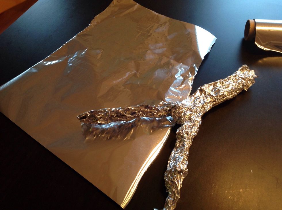 One V will become the legs and the other V is shaped to the form of the body.