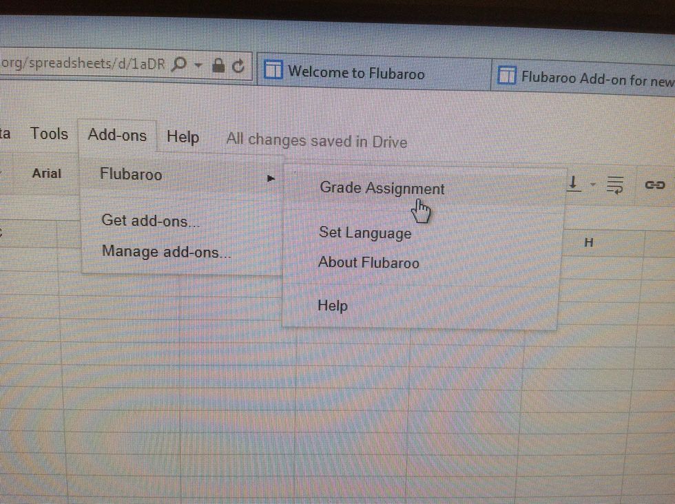 One you have collected the student data from the quizzes, click Add-ons - Flubaroo - Grade Assignment.