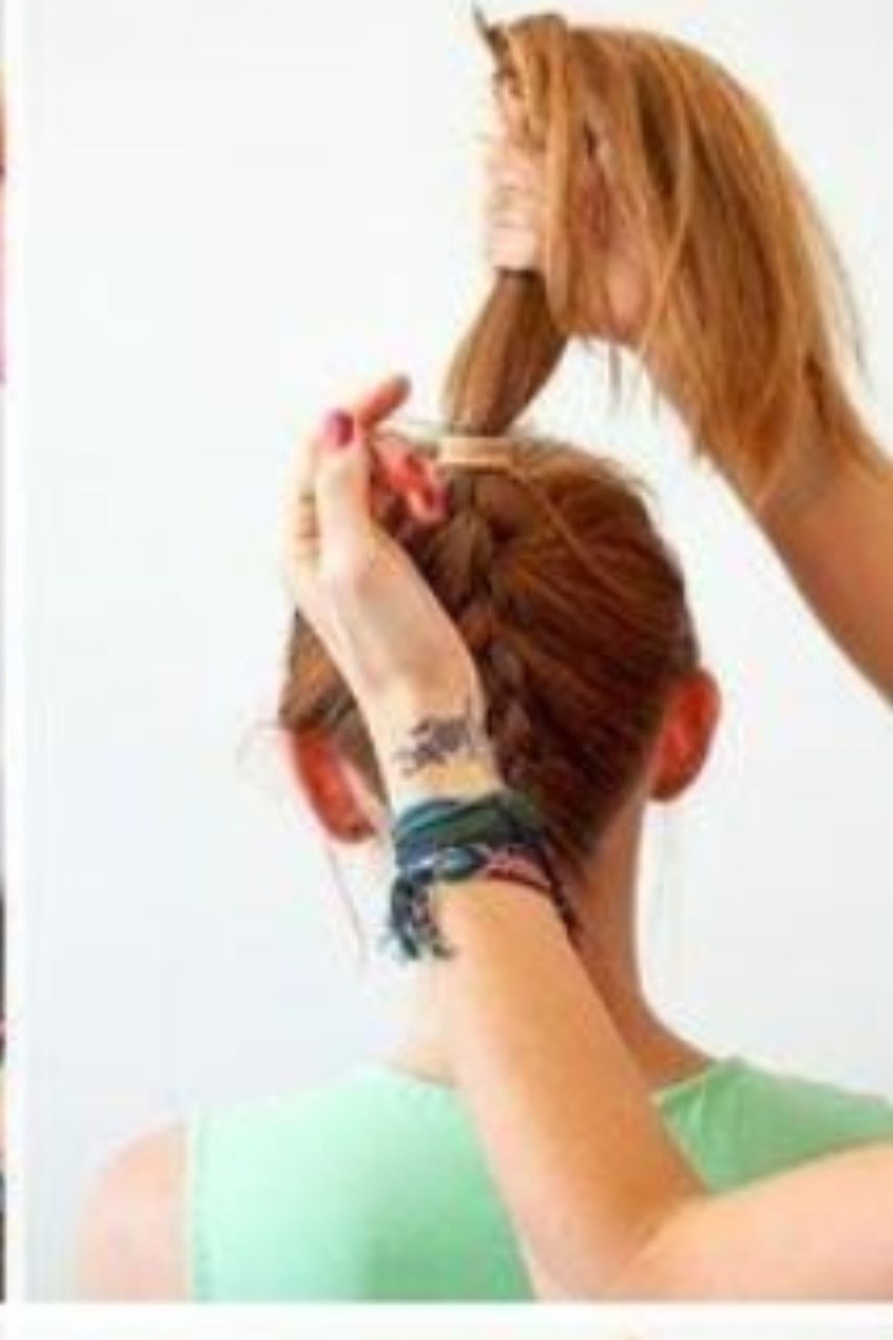 One you reach the top rap hair into a hair tie