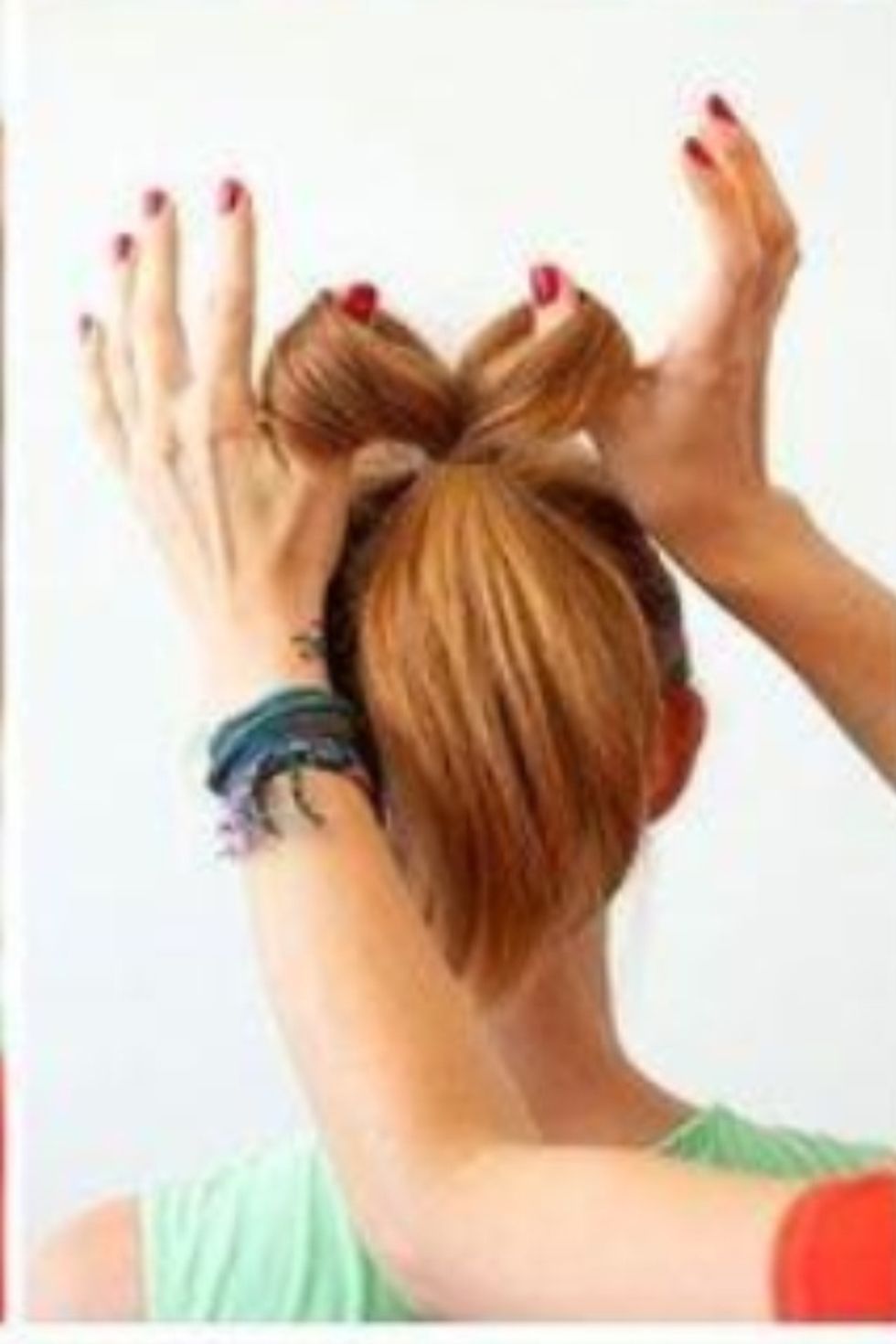 One your hair is in a bun separate it from the middle