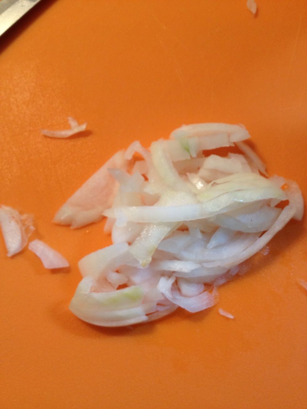 Onion sliced into thin strips.