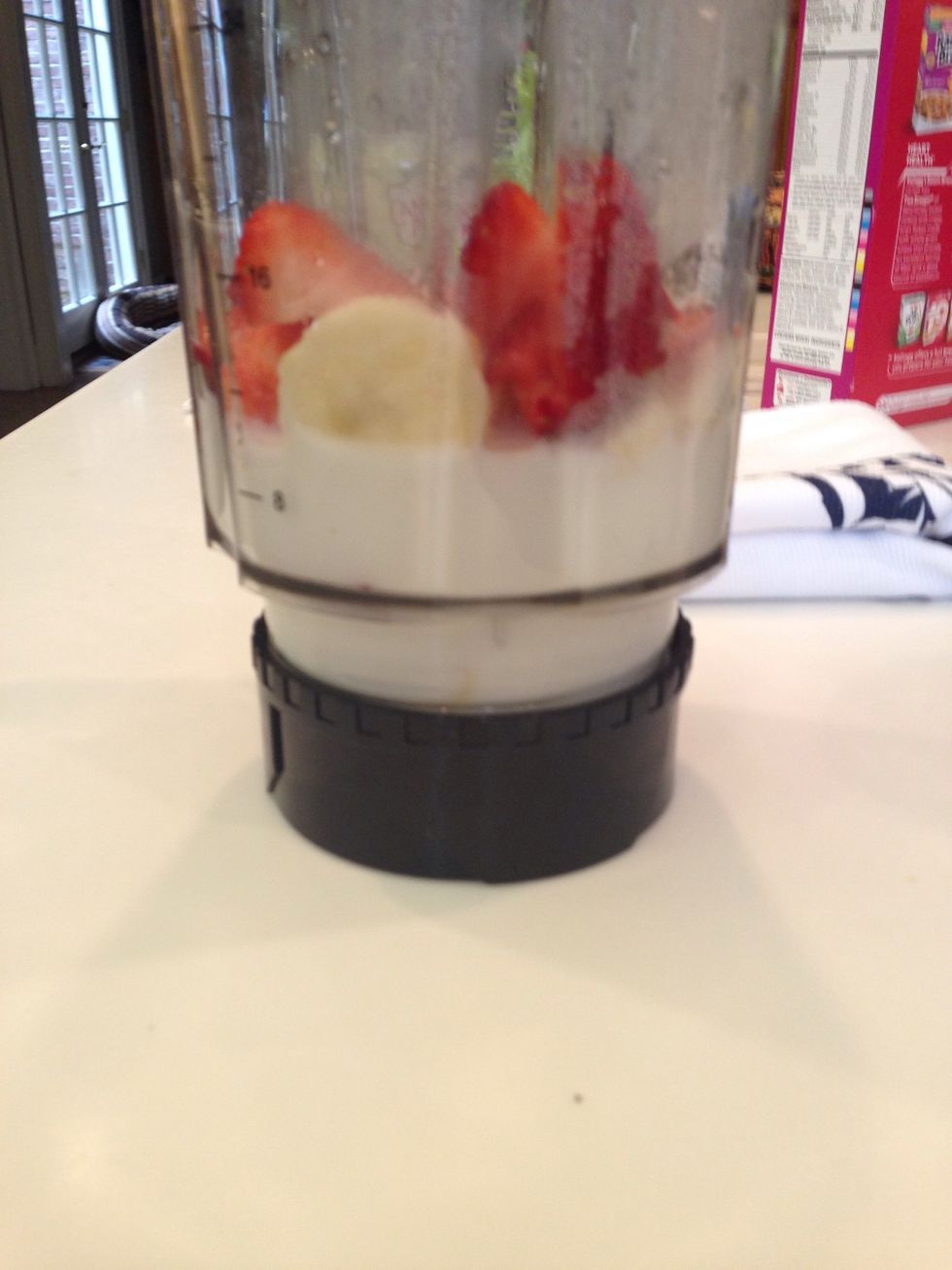 Only pour a little over halfway up. Don't completely cover the fruit or the smoothie will be more like soup.
