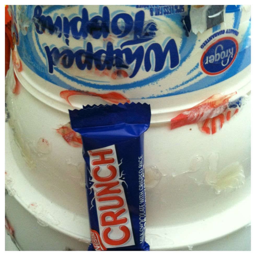 Only use a small dab of glue at the bottom and top so you don't Mel the chocolate.