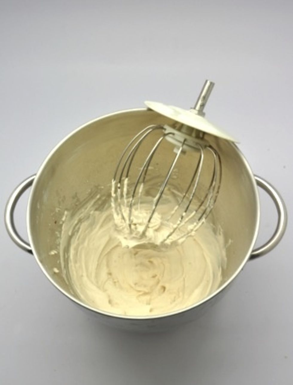 Onto the filling. With the whisk attachment on, whip up the heavy cream along with the icing sugar and hot cocoa powder until stiff peaks are formed. Refrigerate until ready to use.