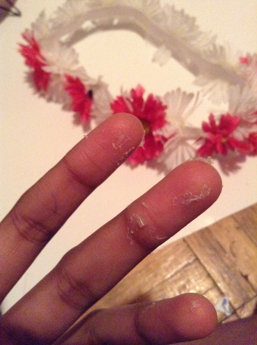 Ooo! Ehhhh, be careful with the glue gun! Don't be stupid like me! If a child, get an adult's help! Get the hot glue ONLY ON THE HEAD BAND STRIP. NOT TOO MUCH!