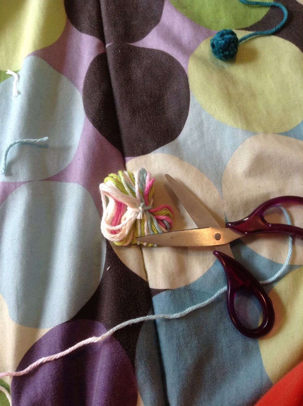 oops all of my yarn isnt in my knot!! I redid my knot (i had to rewrap) know u will have loops cut them