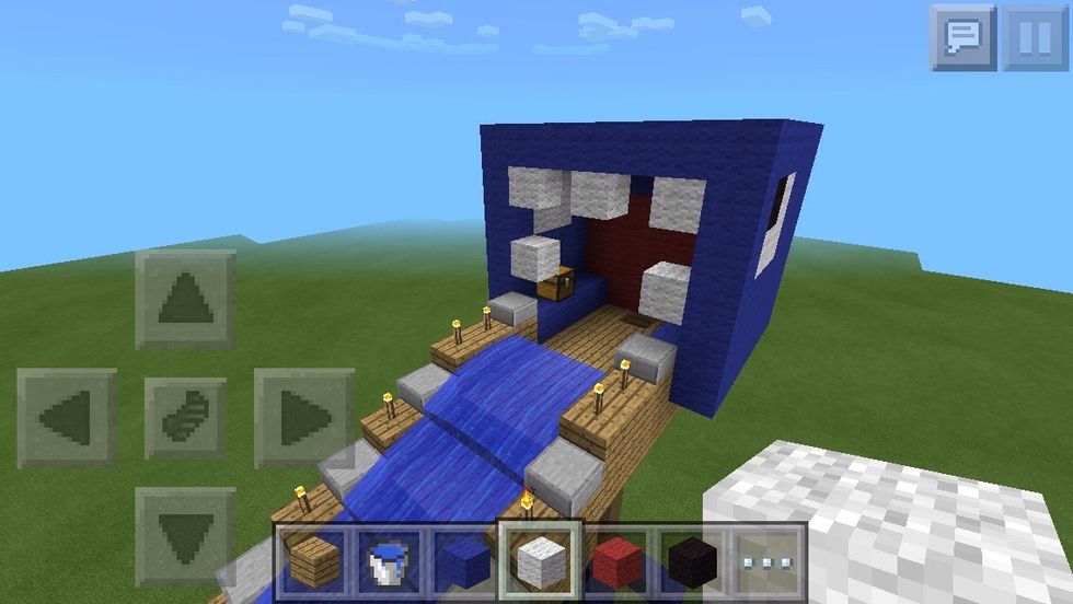 Oops, the head wasn't square enough from the front! See how I destroyed the second highest row of the head and put the teeth there instead?