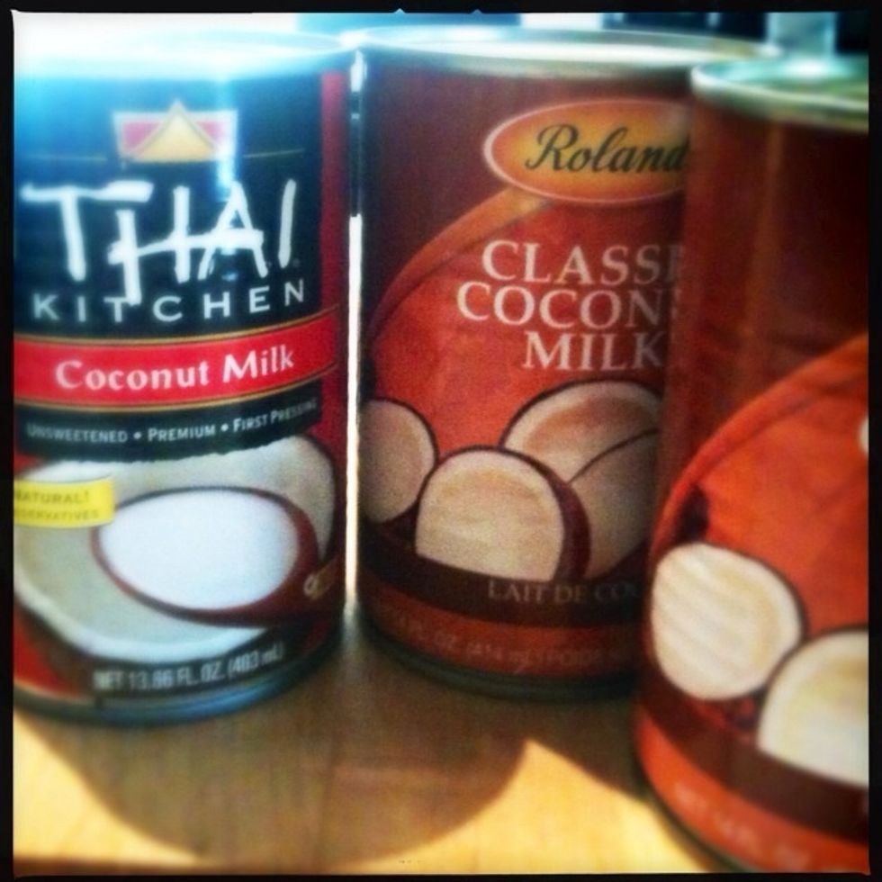 Open 2, 14-ounce cans of coconut milk.