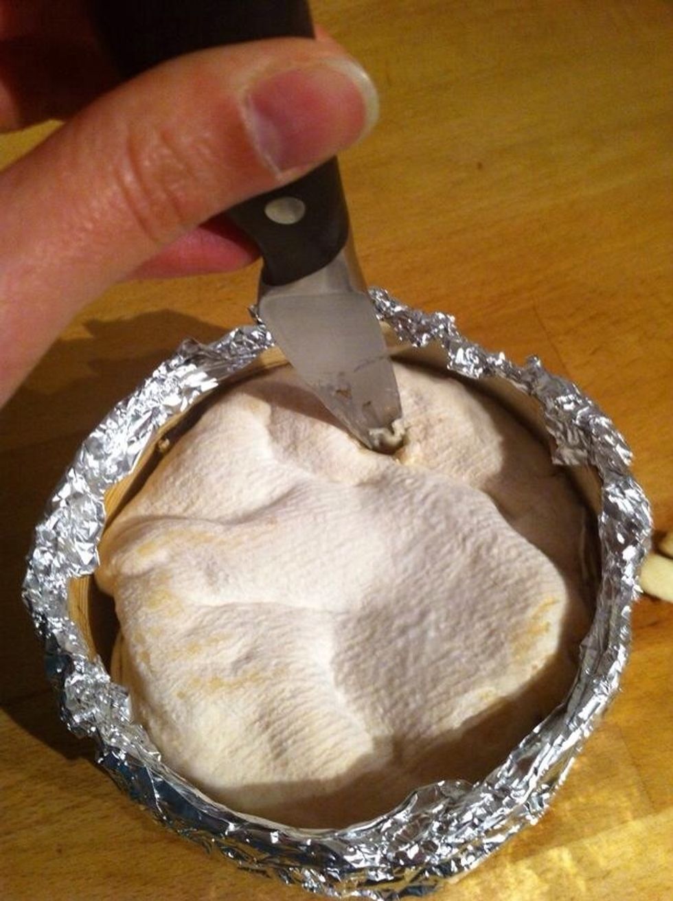 Open a small hole with a knife