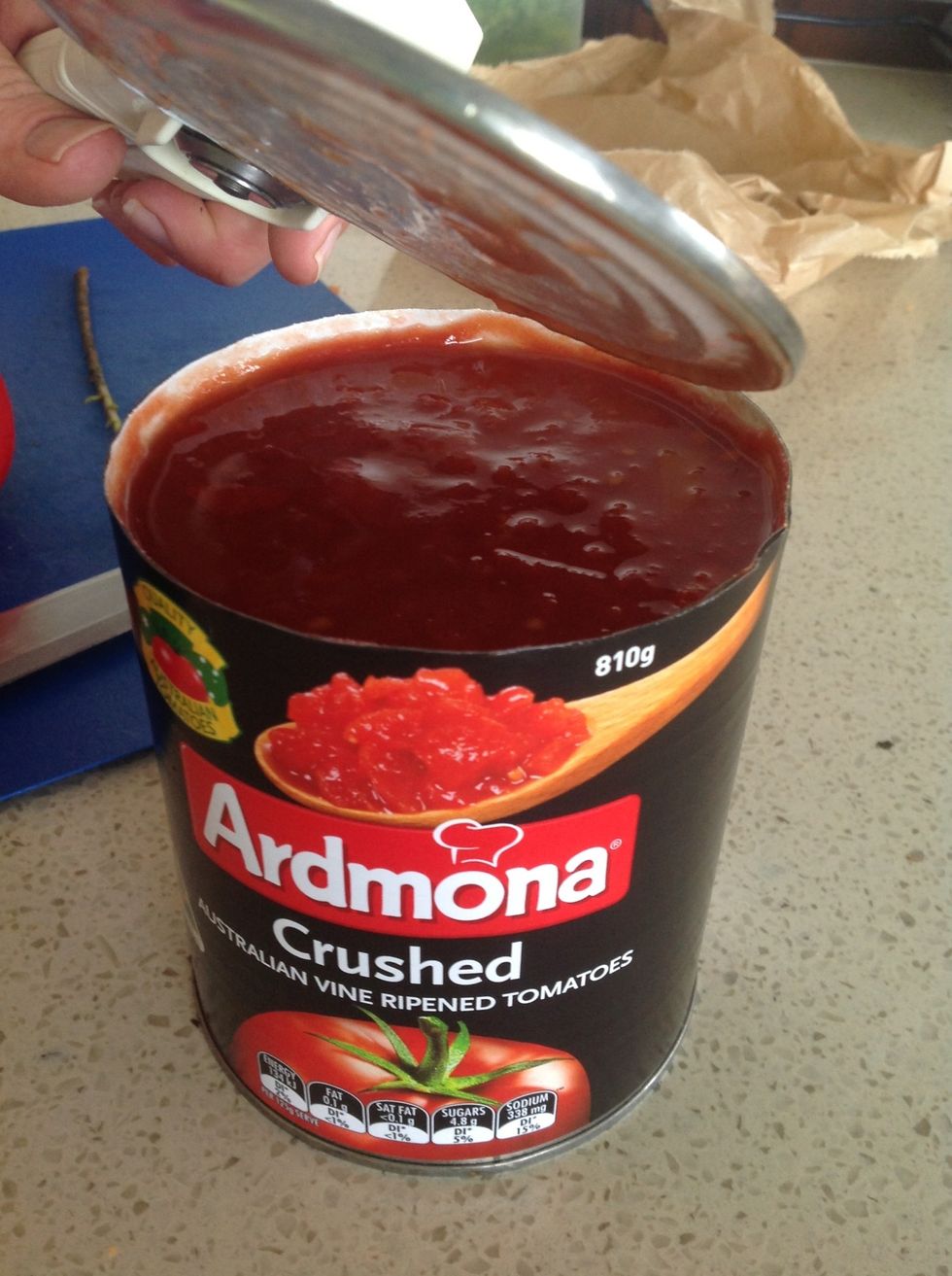 Open a tin of crushed tomatoes