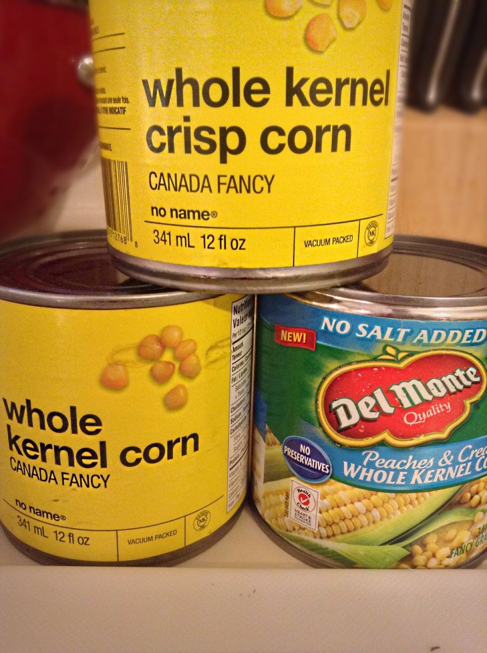 Open and drain the corn.