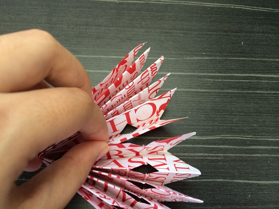open and pinch the middle together.