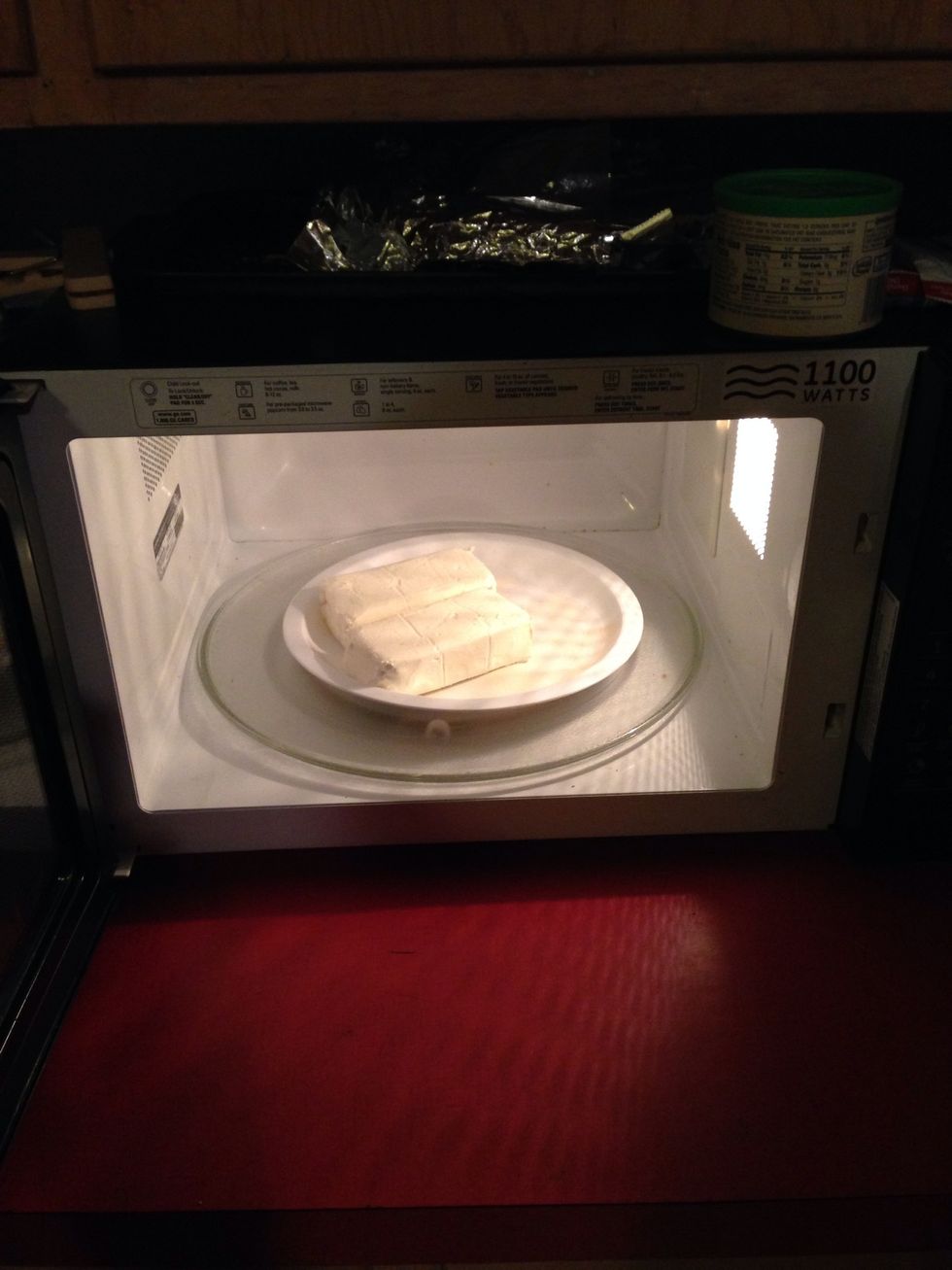 Open and place your two bars of cream cheese in the microwave until nice and soft.