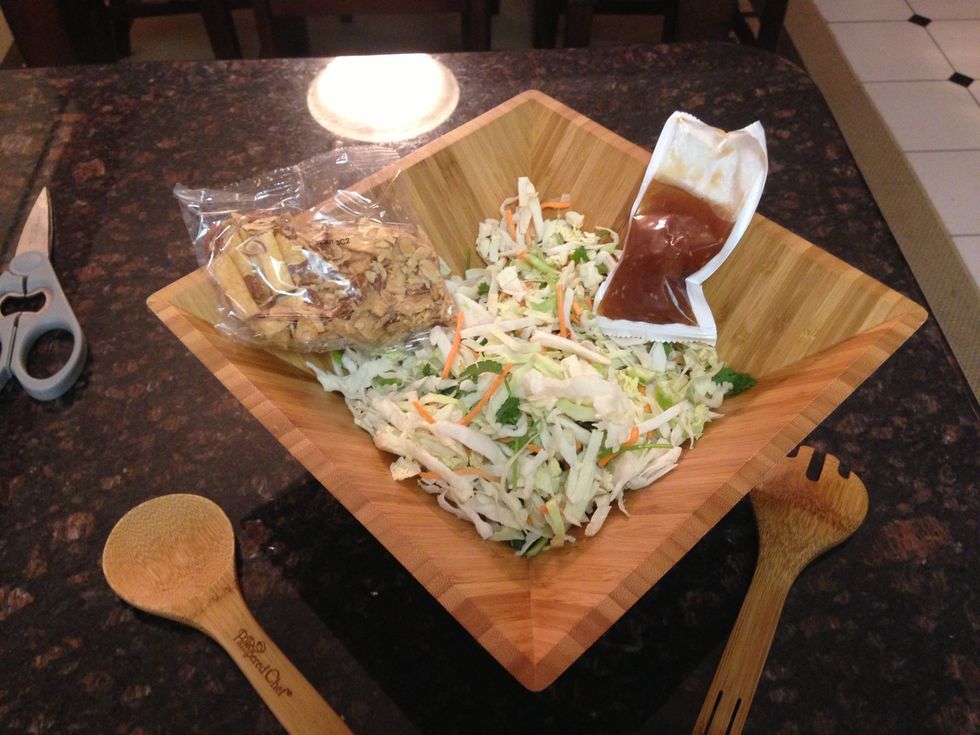 Open Asian chop salad kit. Inside you will find its fixings.