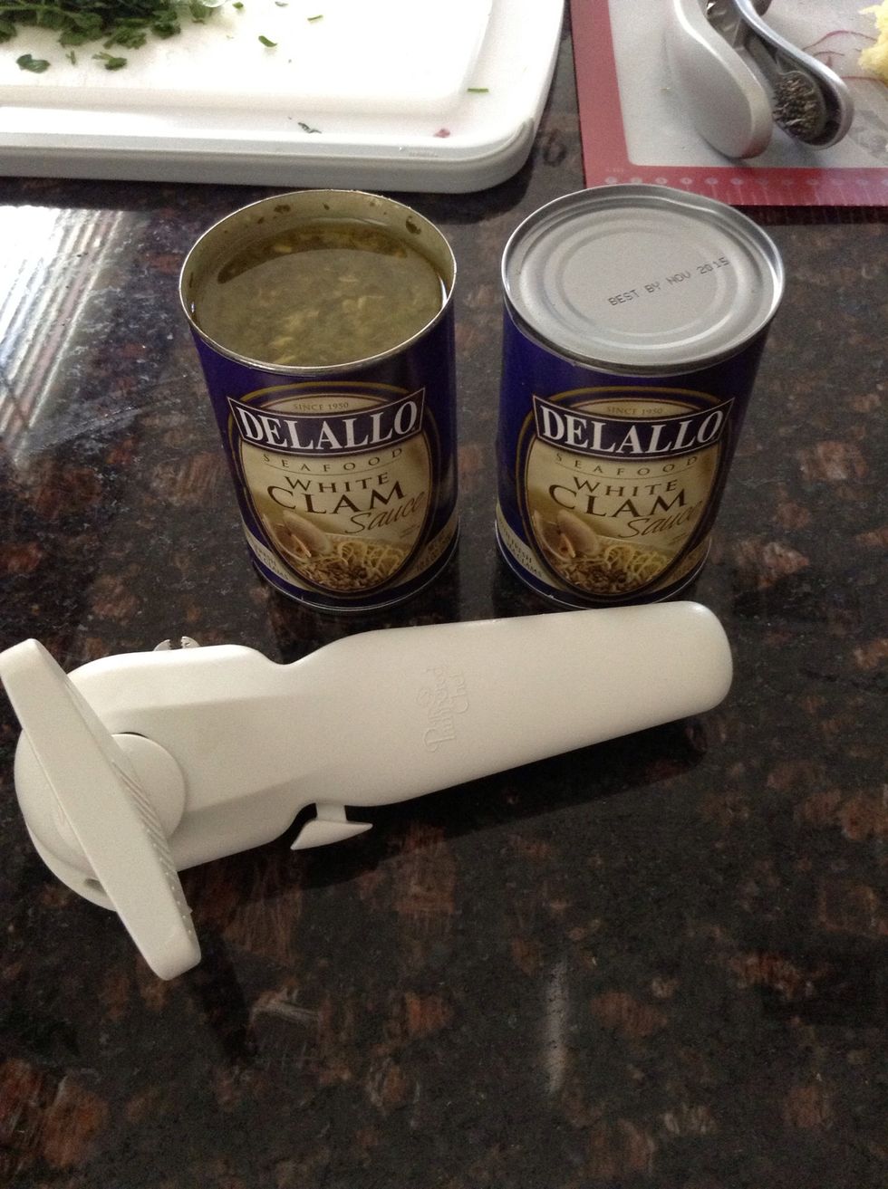 Open both cans of your white clam sauce. (Can be found in all grocery stores in "specialty Italian" section.