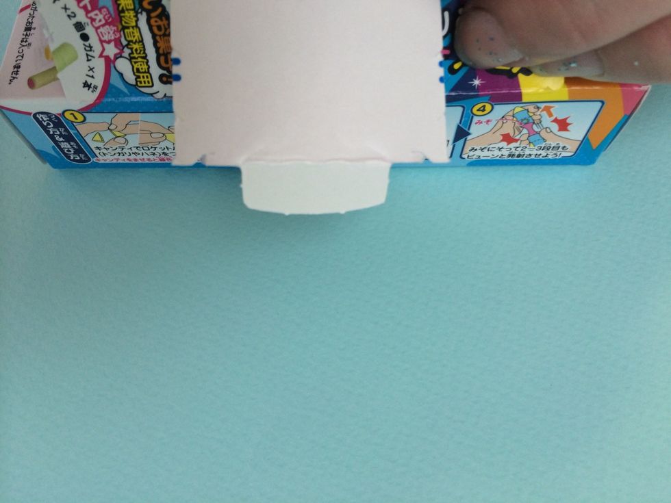 Open box along perforation- Be sure not to tear