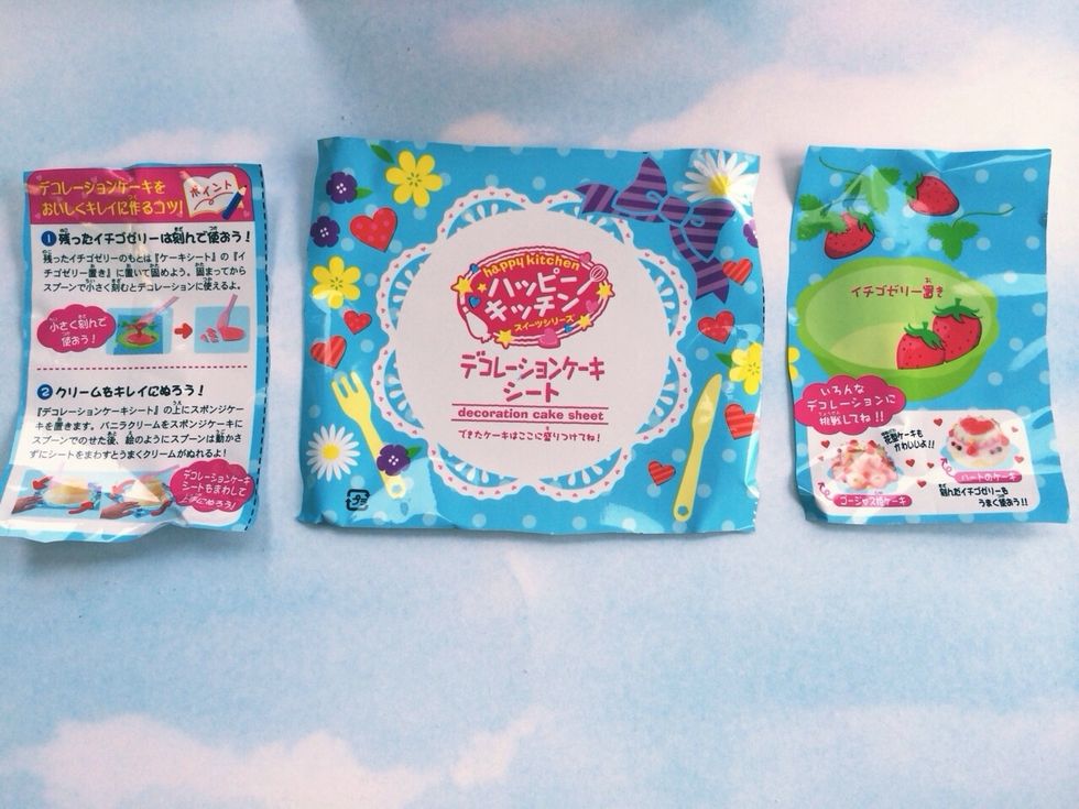 Open box and carefully cut packaging to create Placemat and Strawberry Jelly Cutting Mat *^~^* Also Included(shown next page) tray with Water Measure Cup, Cake Pan Mold, Berry Mold