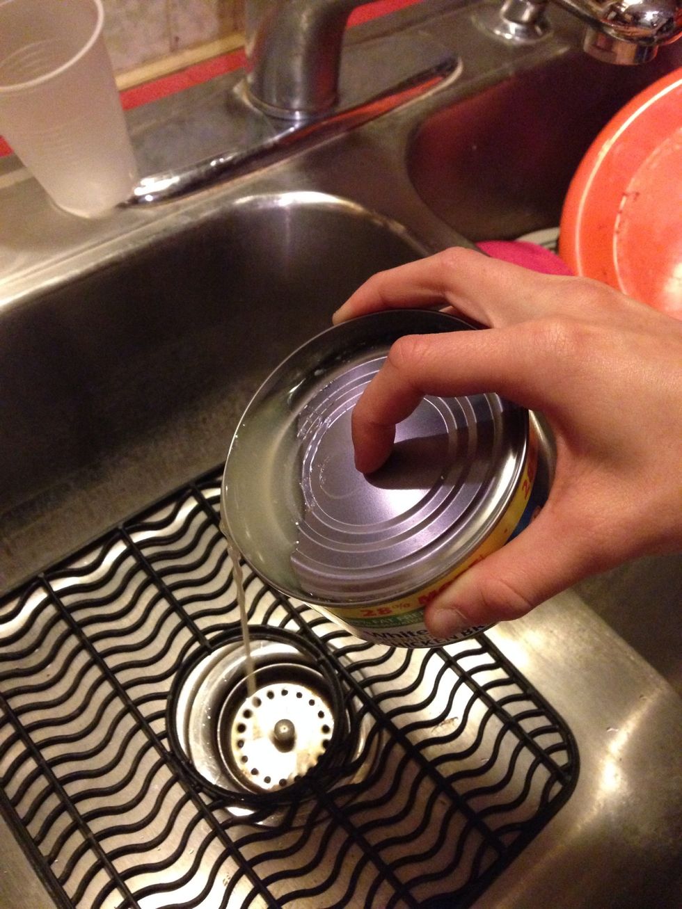 Open cans and dump out the water.