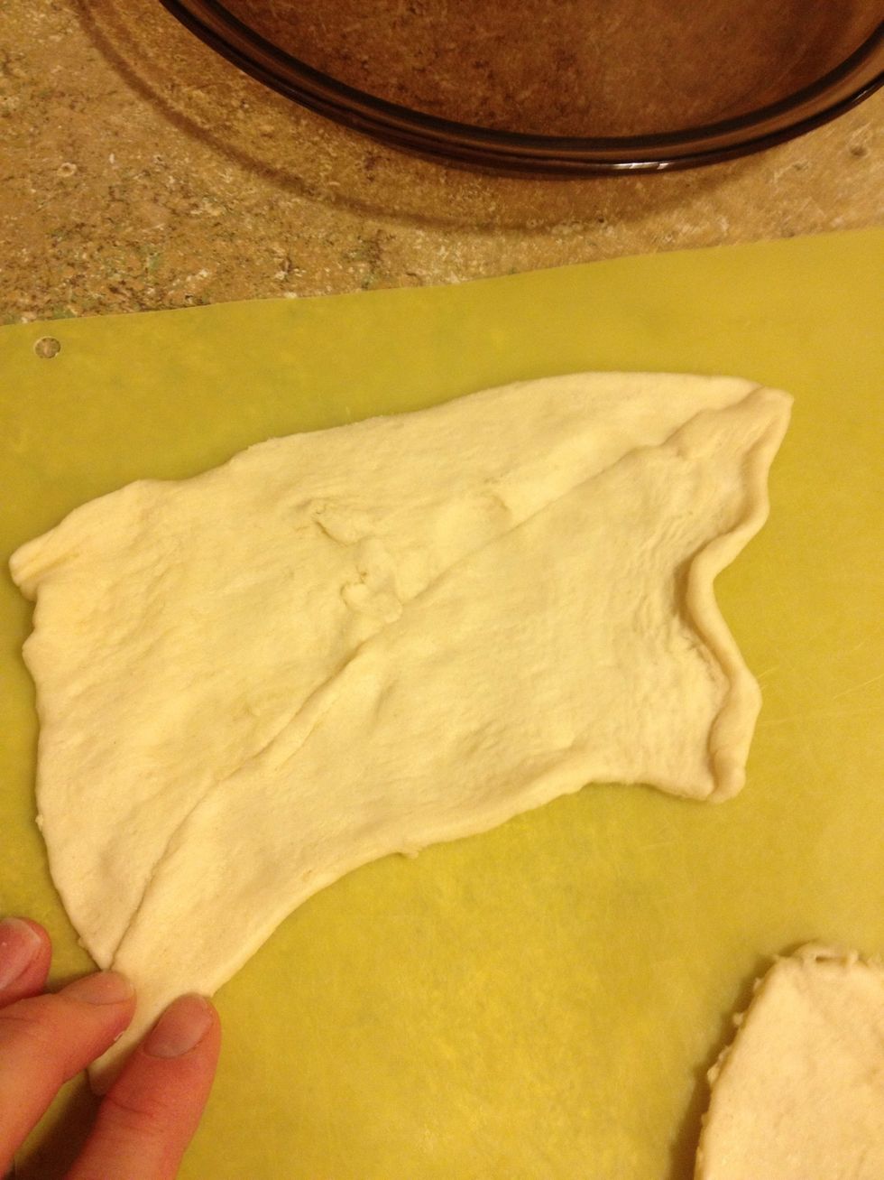 Open crescent rolls (I'm using two cans) and pitch about four together