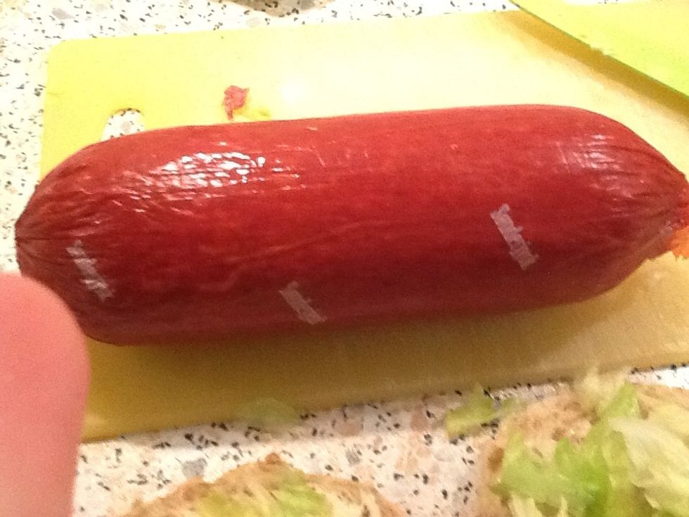 Open it. AND remenber to take the plastic of. I forgot and eat it... :D