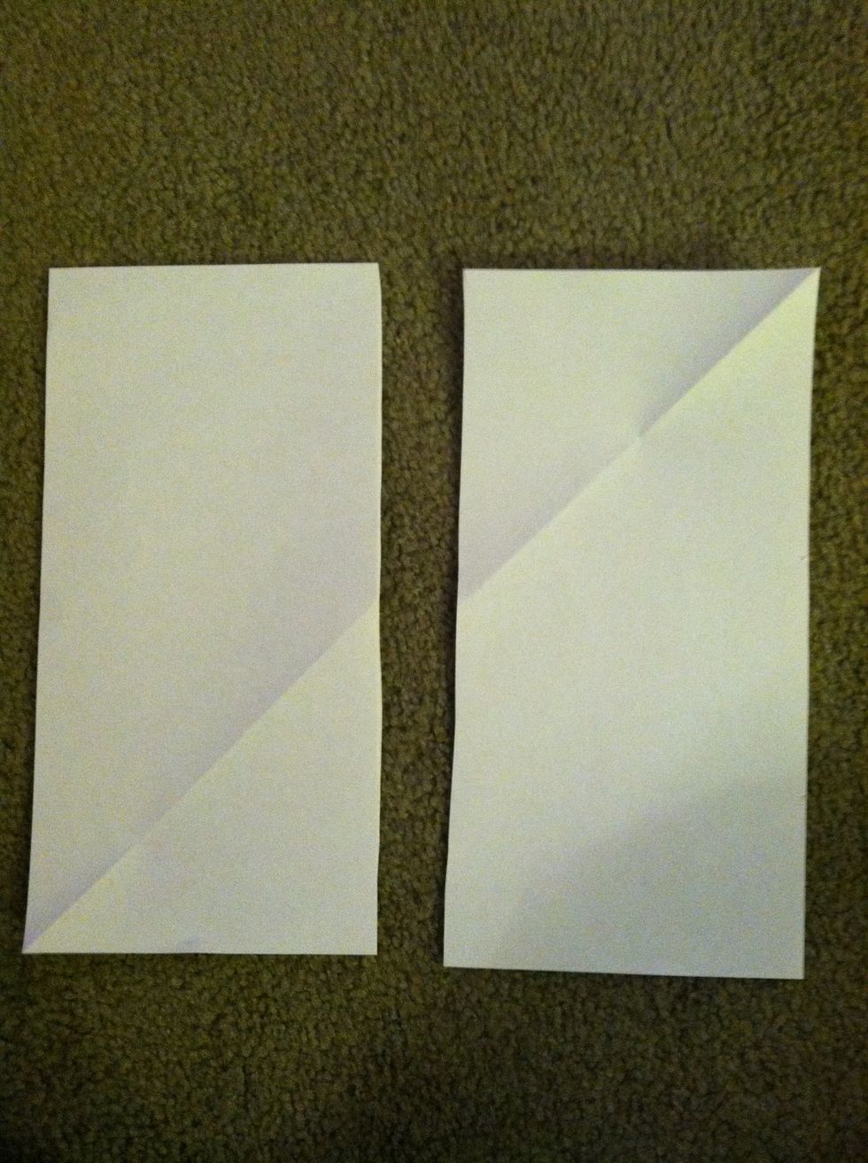 Open it up again and use the line marked by the folding as a guide to cut it in half.