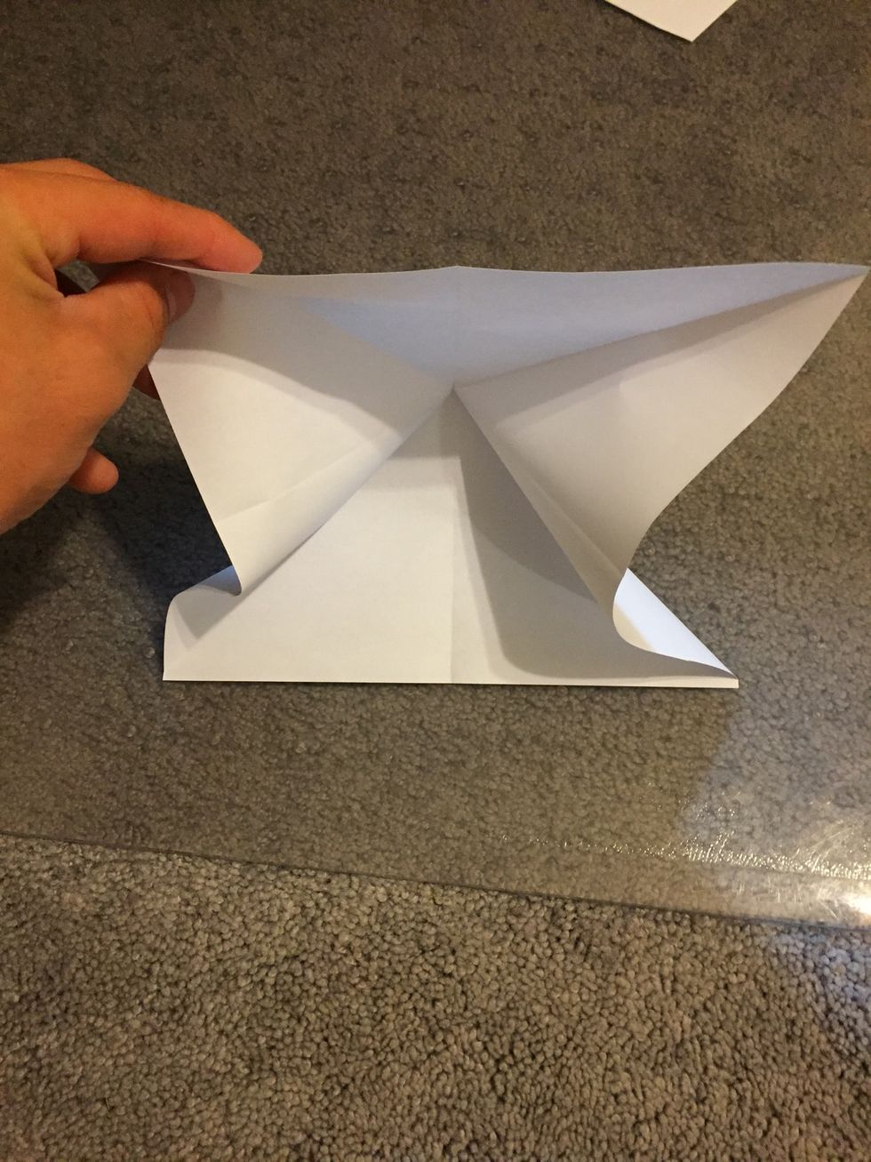 Open it up again, then take in the sides towards the middle