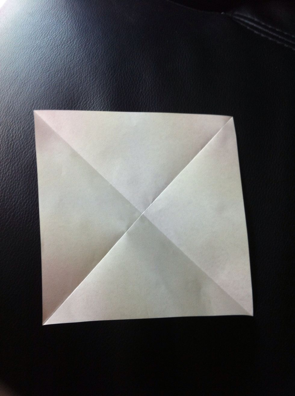Open it up and you should have an X for a crease.