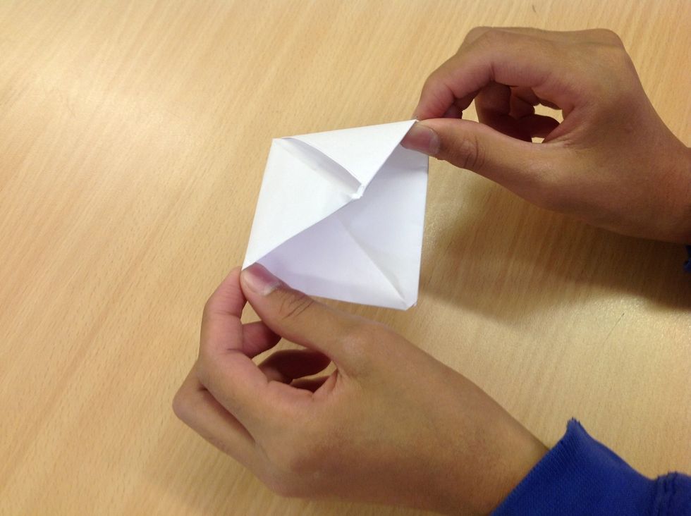 Open it up from the bottom.