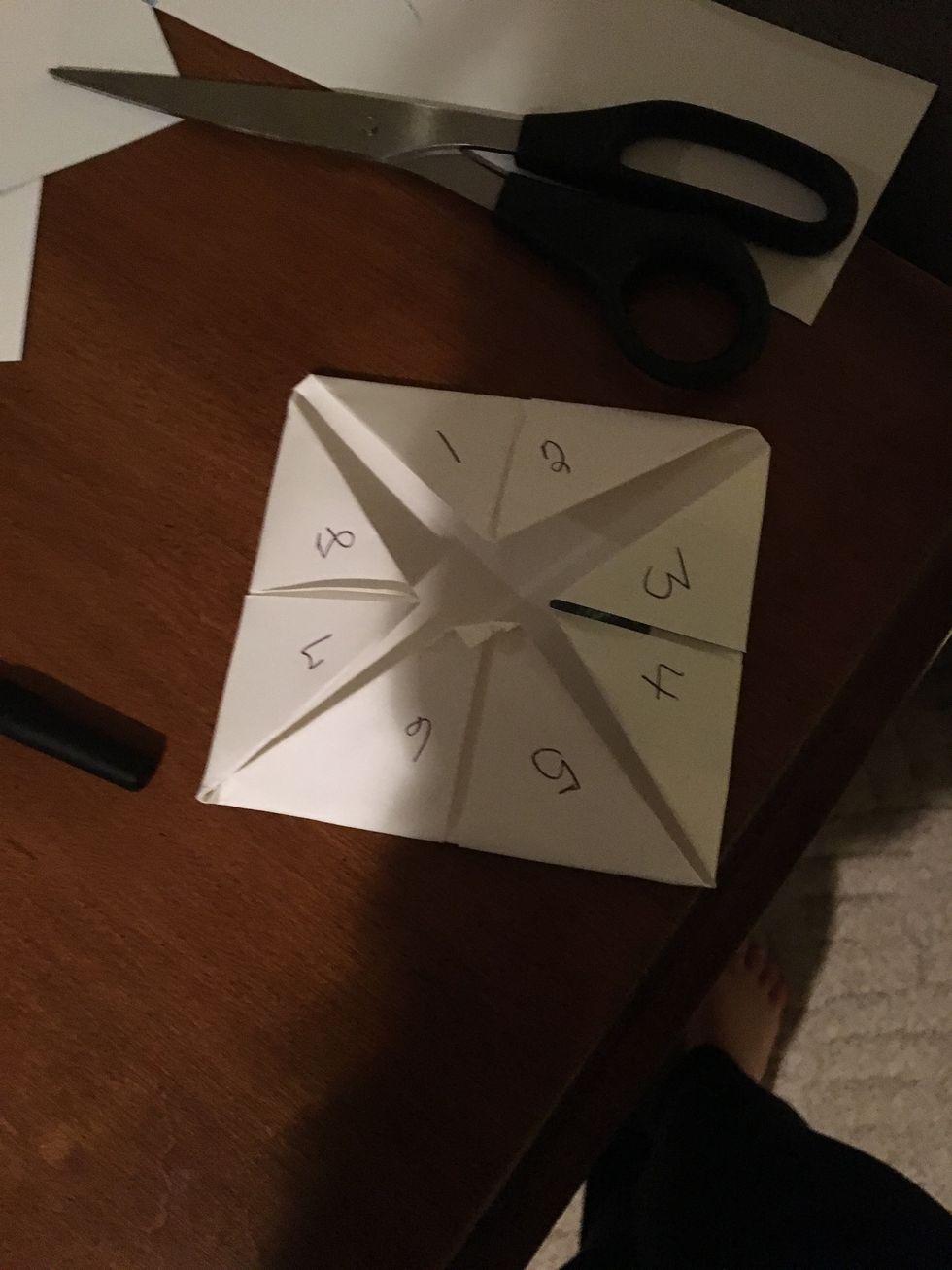 Open it up on the inside and write numbers on the inside it doesn't have to be in order though