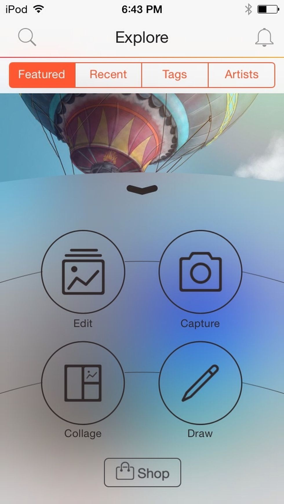 Open PicsArt, click on the center button on the bottom of the screen, and click on "Edit."