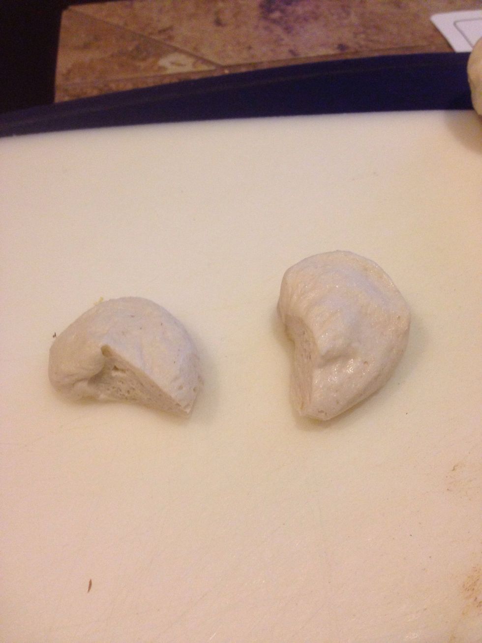 Open the 2nd can on biscuits. Use two to fill the pan and cut 6 of them in half.