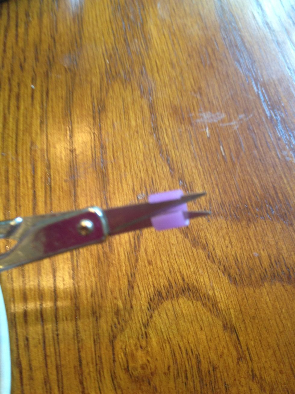 Open the bead so it will be easier to put it on the cord