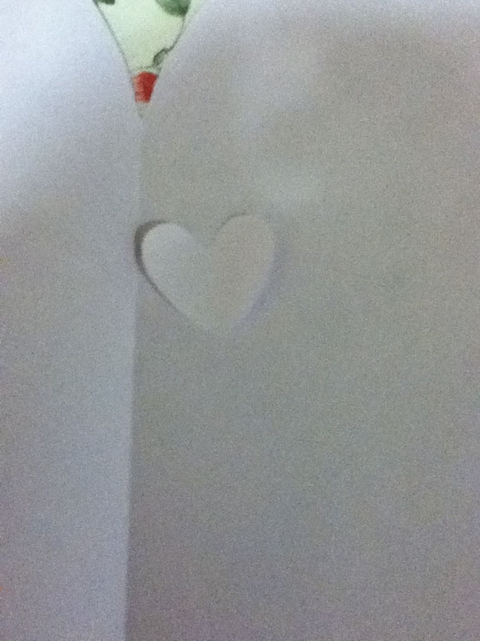 Open the card and place the cutout at one place