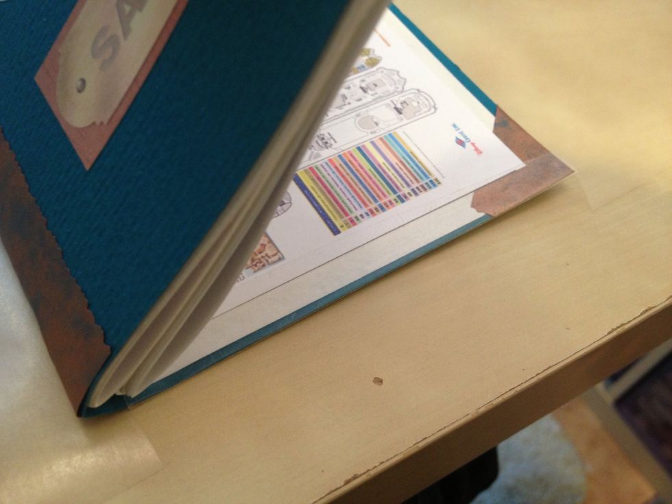 Open the cover and fold the bottom and top edges of con-tac paper over the cover.