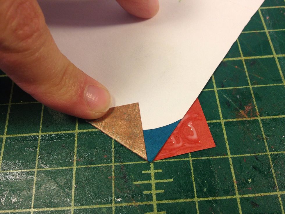 Open the cover and fold the corner flaps in.