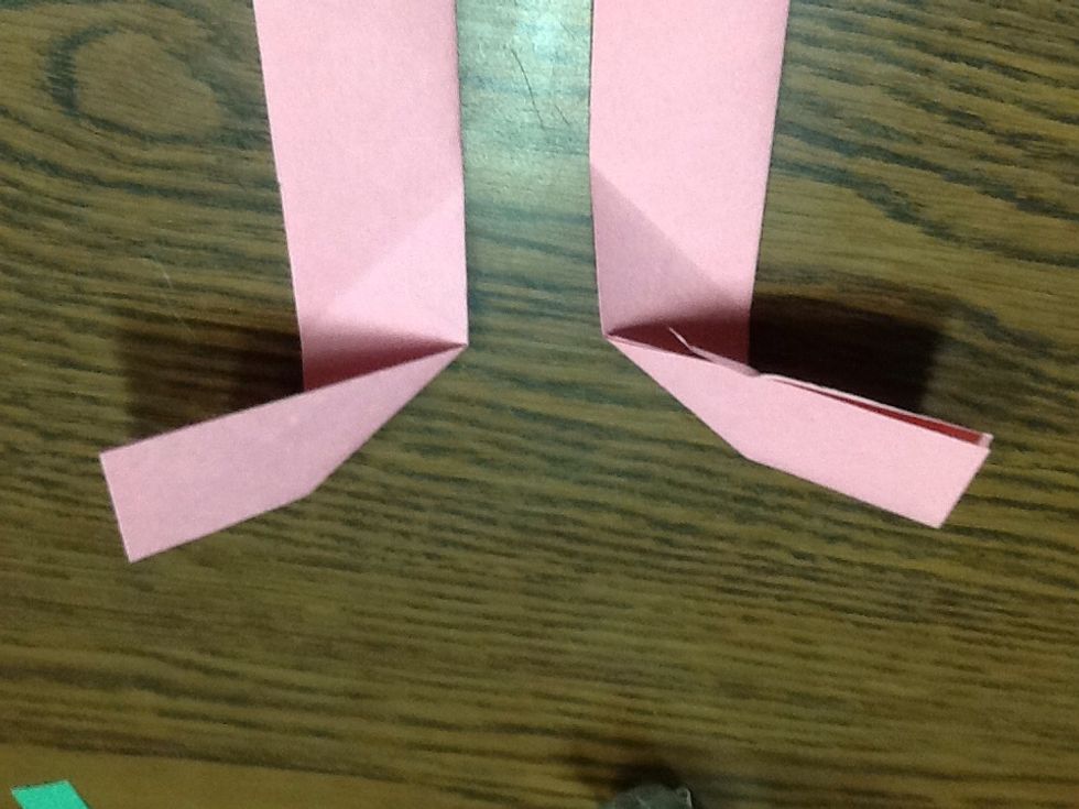Open the flap then fold one of them up and one of them down